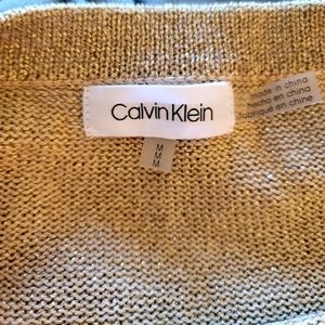 Beautiful gold glimmering sweater